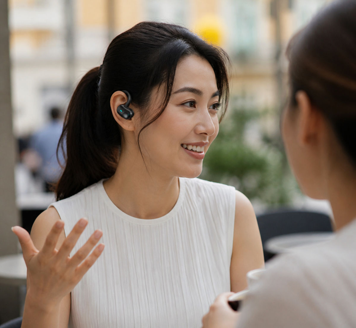Lifestyle photo of a customer using Smart Translation Earbuds